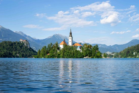 Lake Bled with Bled Castle perched atop a cliff in the background